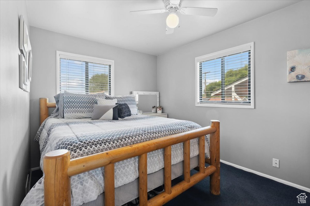 Bedroom with carpet and ceiling fan