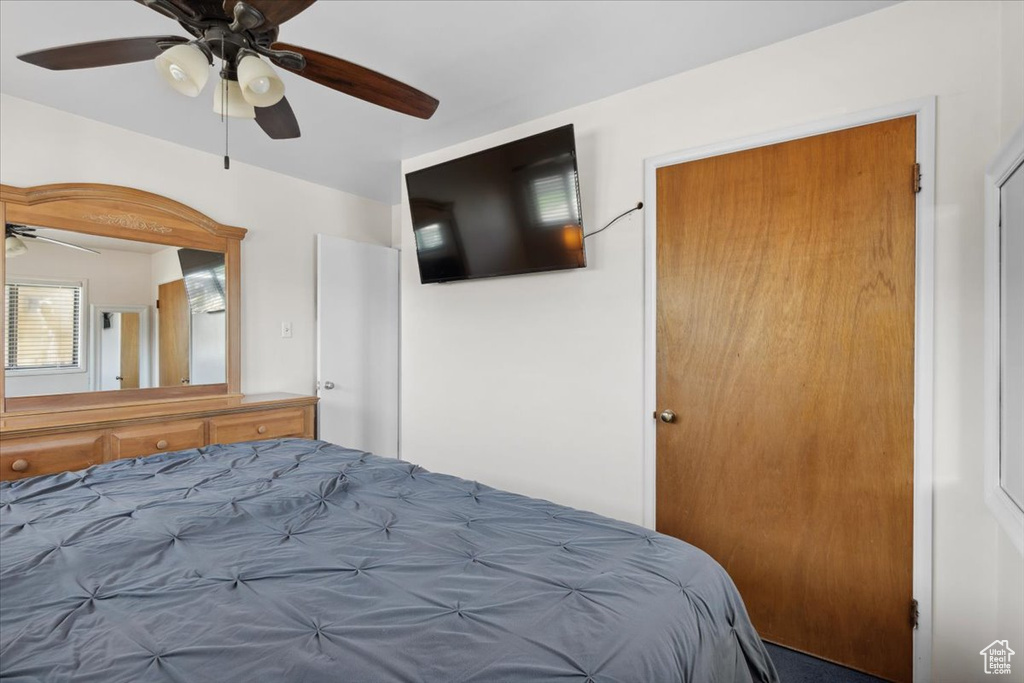 Bedroom featuring ceiling fan