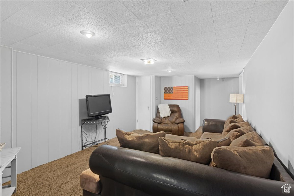 Living area featuring carpet