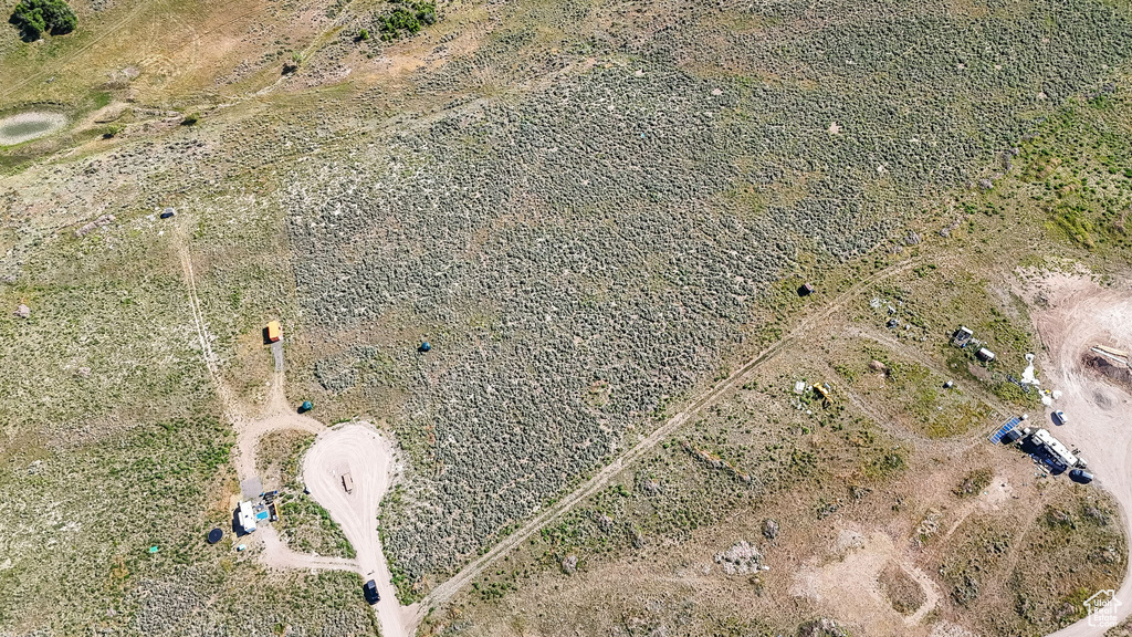 Aerial view of property and surrounding area with rural landscape