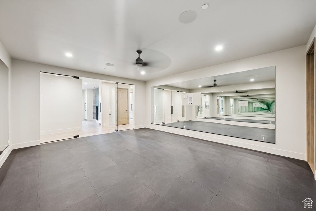 Spare room with ceiling fan and recessed lighting