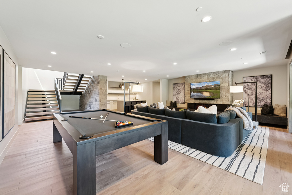 Game room featuring billiards table, light wood-style floors, and recessed lighting