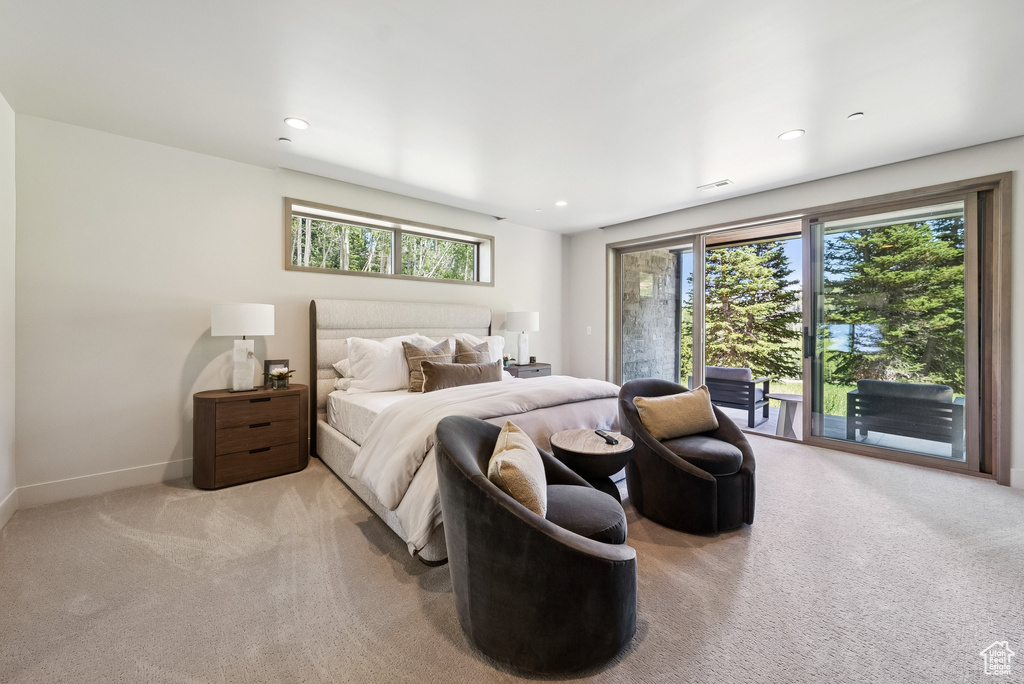 Carpeted bedroom featuring access to outside and recessed lighting