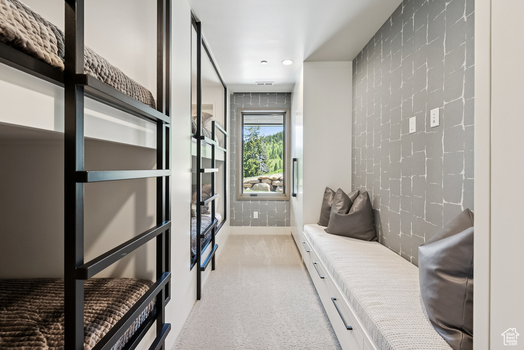 Mudroom featuring light carpet and recessed lighting