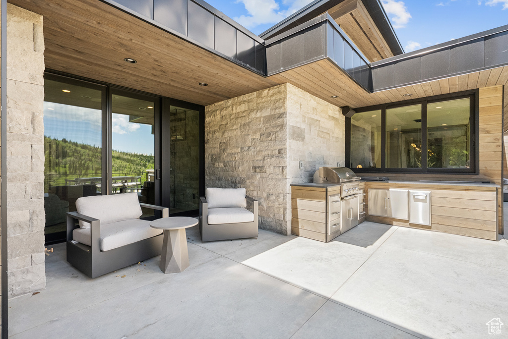 View of patio with area for grilling