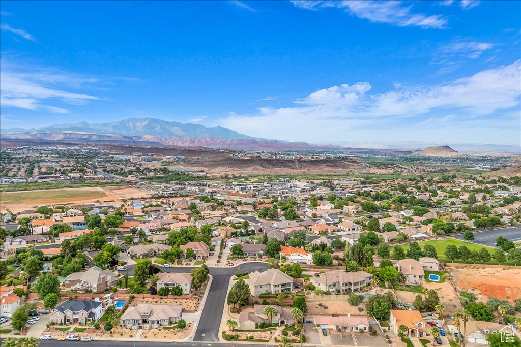 Aerial view of residential area with a mountain backdrop