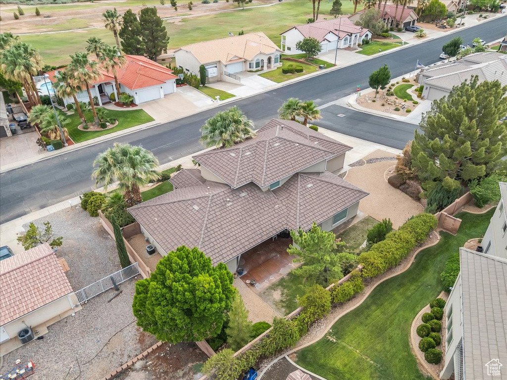 Aerial perspective of suburban area with a local golf course
