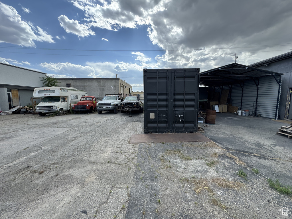 View of parking with mail area