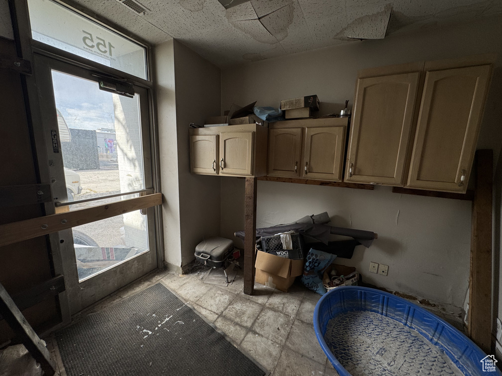 Laundry room featuring plenty of natural light