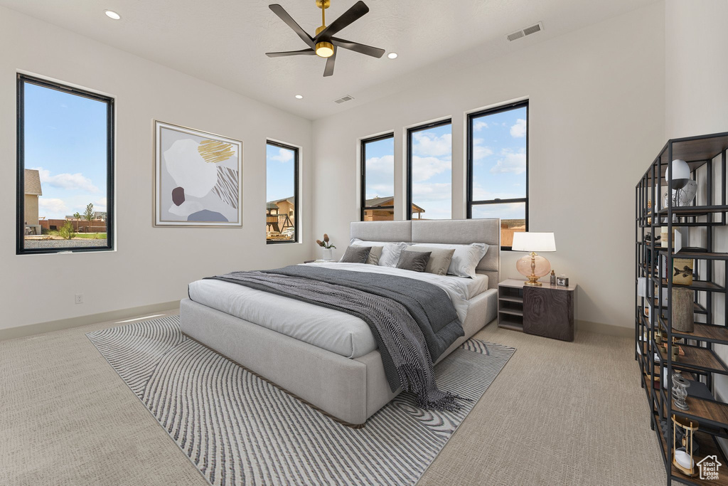 Bedroom with carpet flooring, recessed lighting, and a ceiling fan