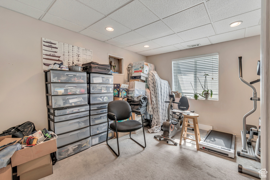 Office area with a paneled ceiling, carpet, and recessed lighting