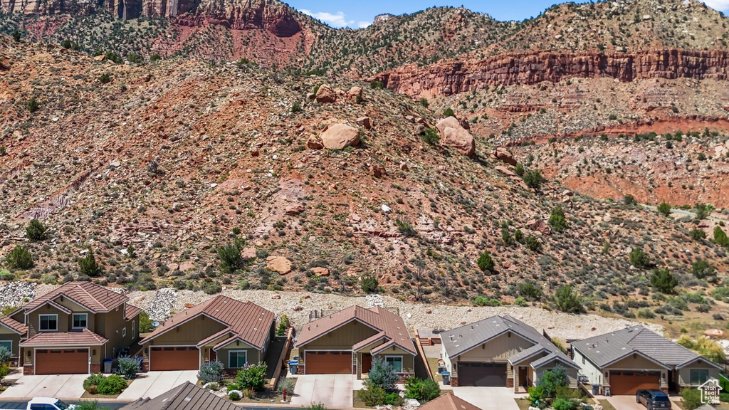 View of mountain backdrop with nearby suburban area