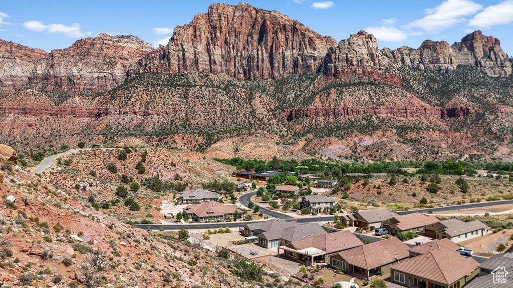 View of mountain backdrop with nearby suburban area