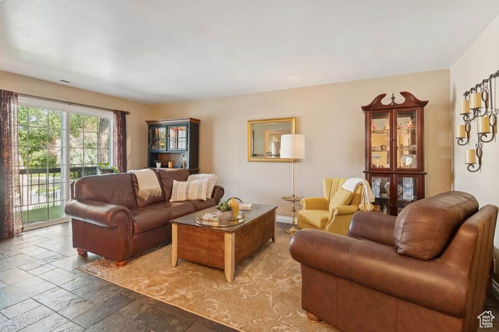 Living area with stone tile floors