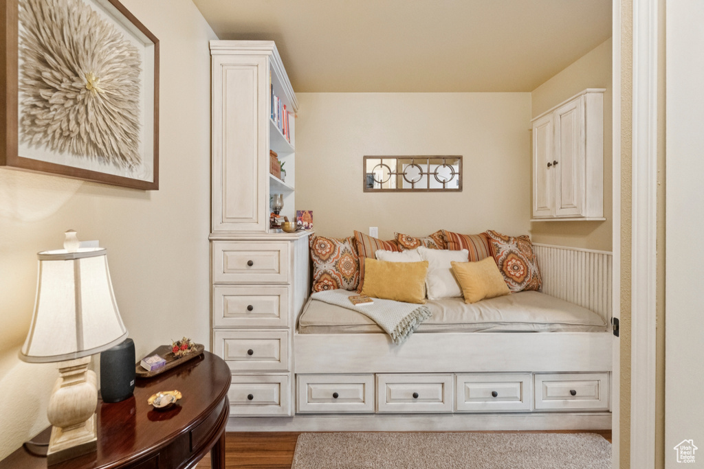 Bedroom with wood finished floors