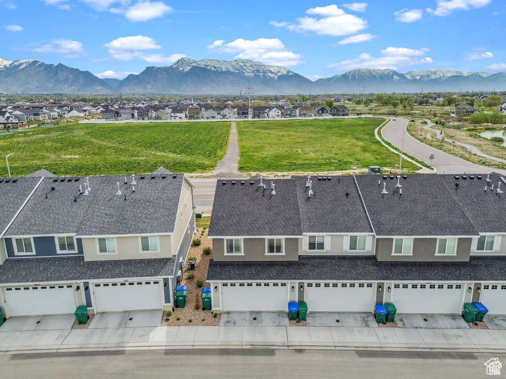 Aerial view of residential area with a mountain backdrop