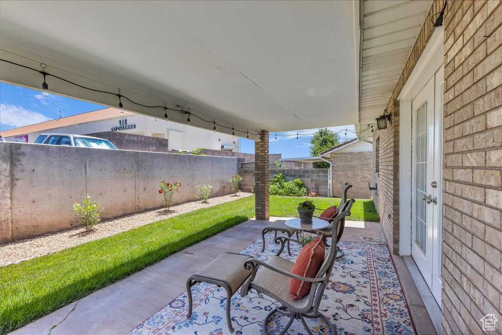 Fenced backyard featuring a patio area