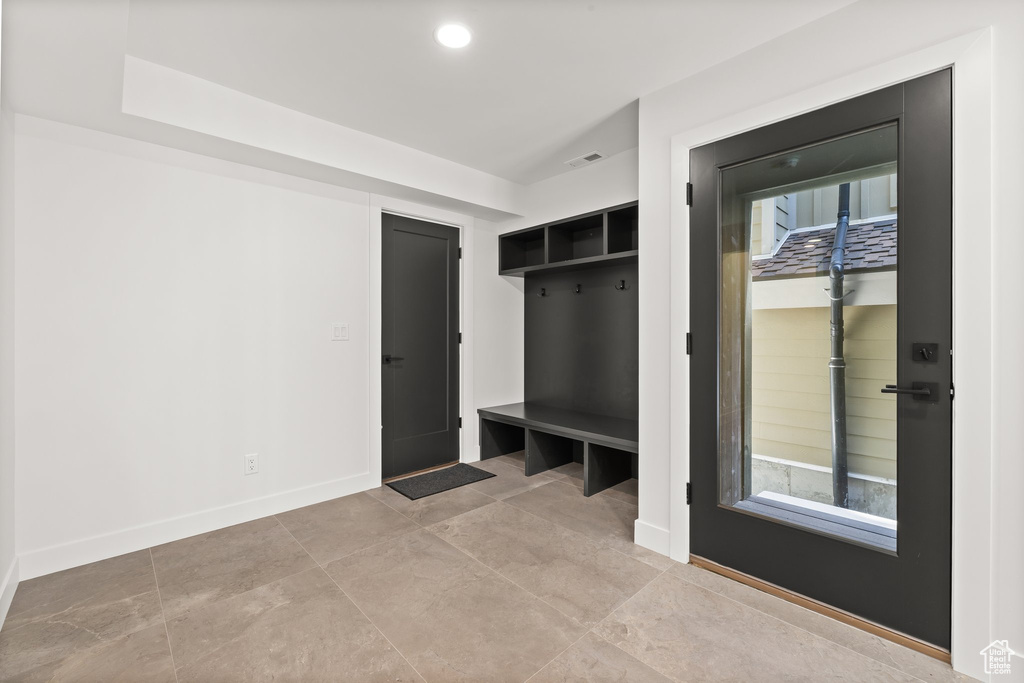 Mudroom with baseboards and recessed lighting