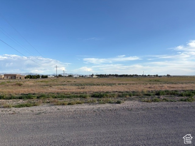 View of yard with a view of countryside