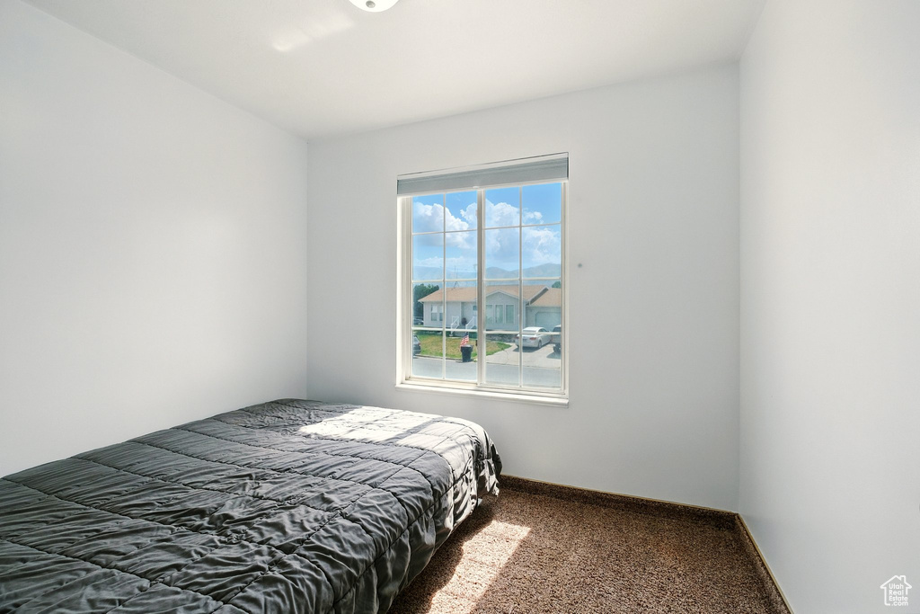 Bedroom featuring carpet
