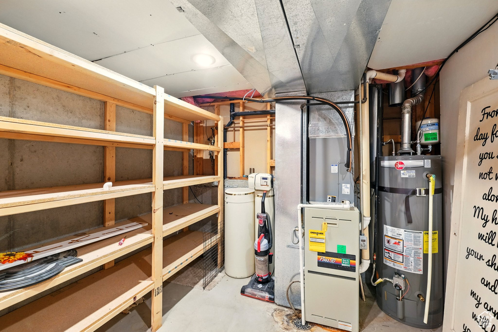 Utilities featuring water heater and heating unit