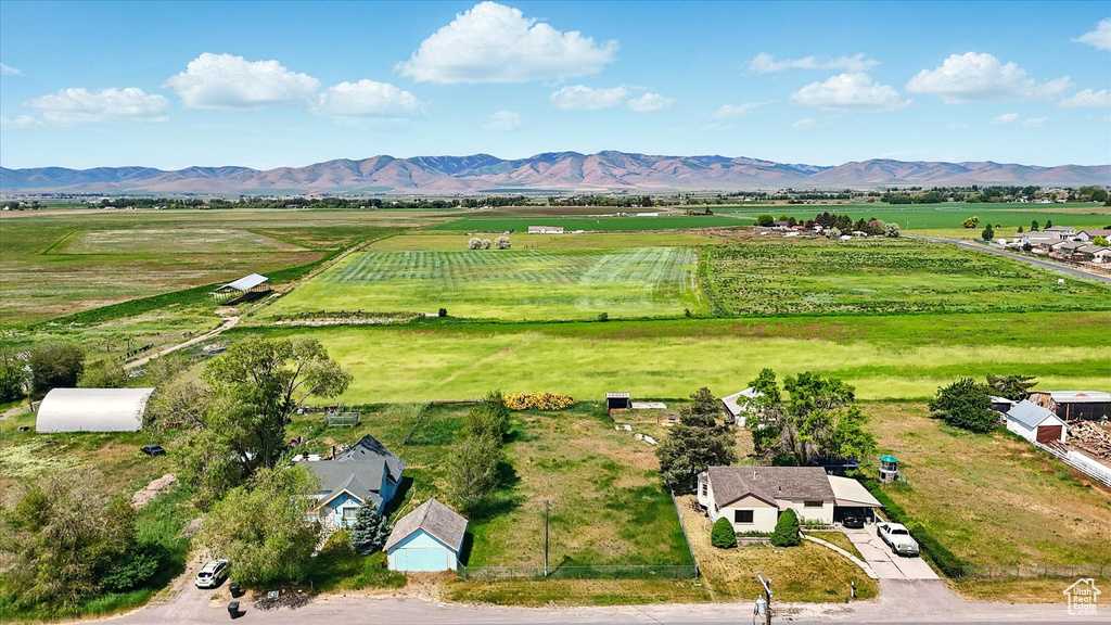 View of rural area featuring mountains and extensive farmland