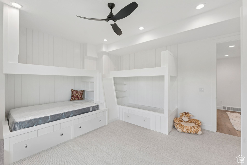Unfurnished bedroom with recessed lighting, carpet, and a ceiling fan