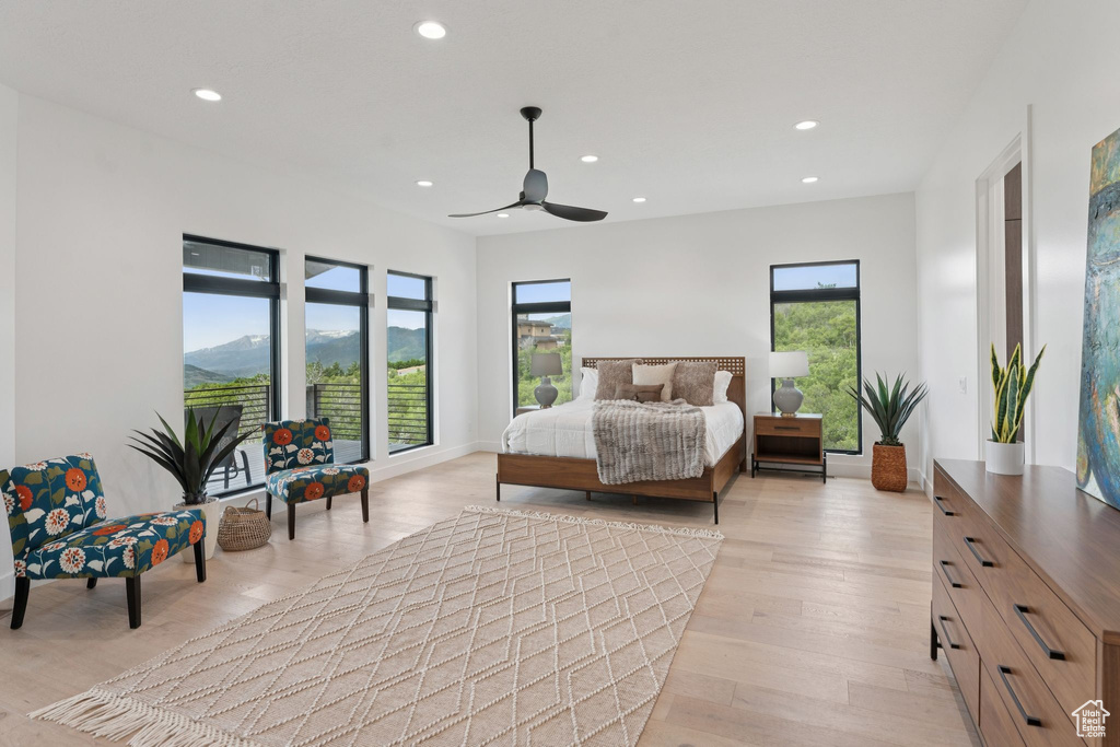 Bedroom featuring recessed lighting, light wood-style floors, and ceiling fan