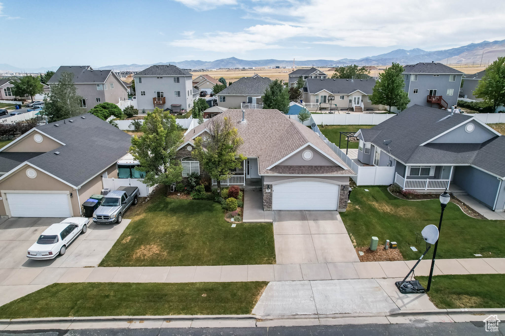Aerial perspective of suburban area featuring mountains