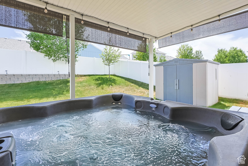 Unfurnished sunroom with a jacuzzi