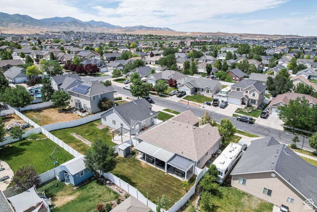 Aerial view of residential area with a mountain backdrop