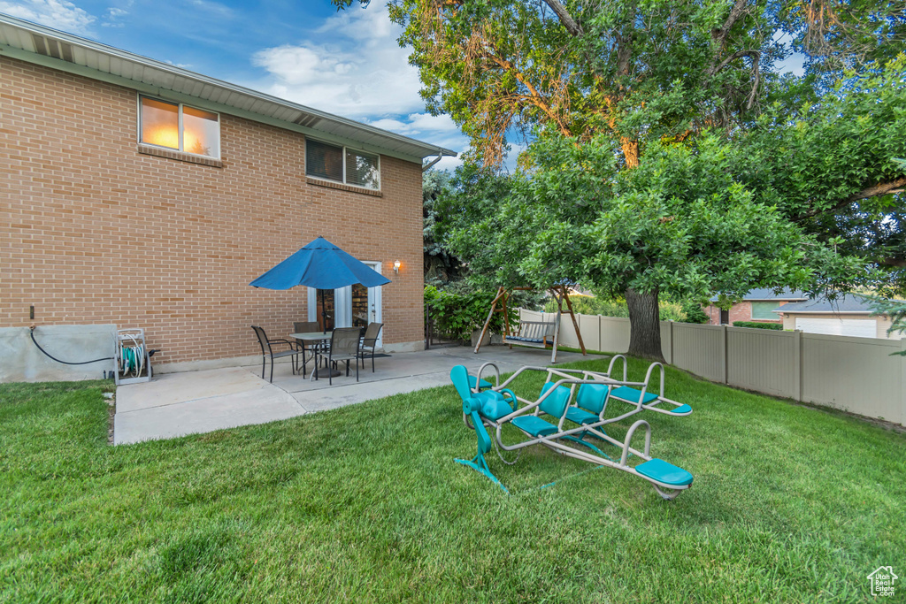 View of yard with a patio