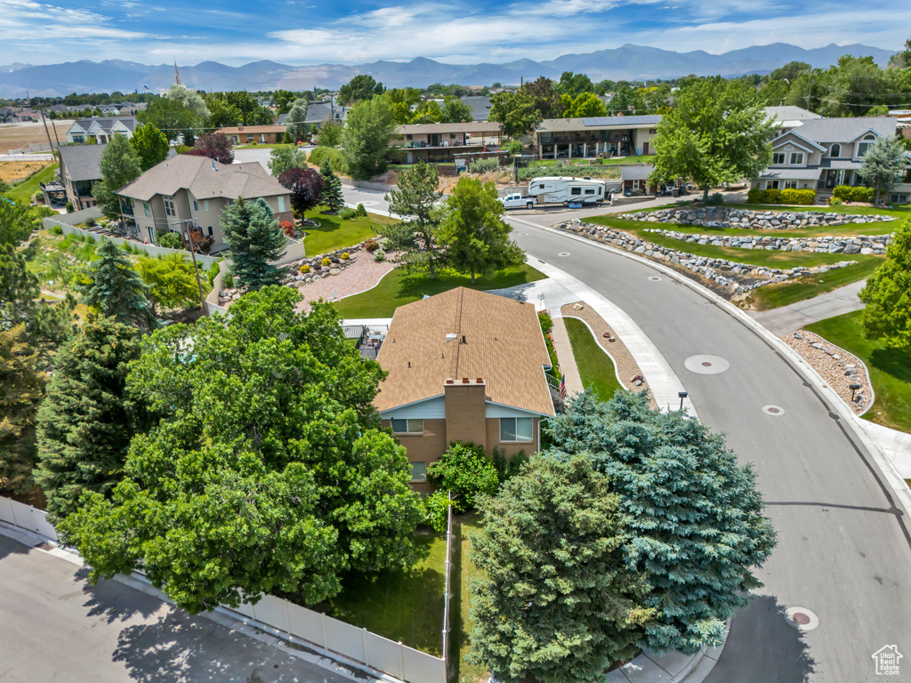 Aerial perspective of suburban area featuring mountains