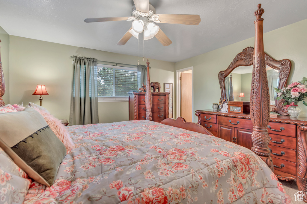Bedroom featuring a ceiling fan