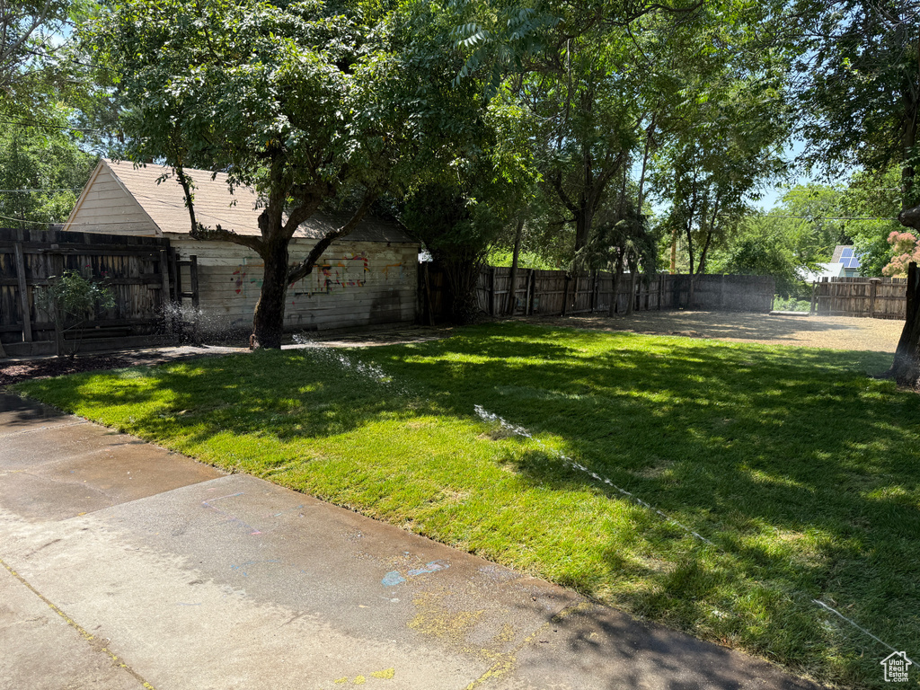 View of fenced backyard