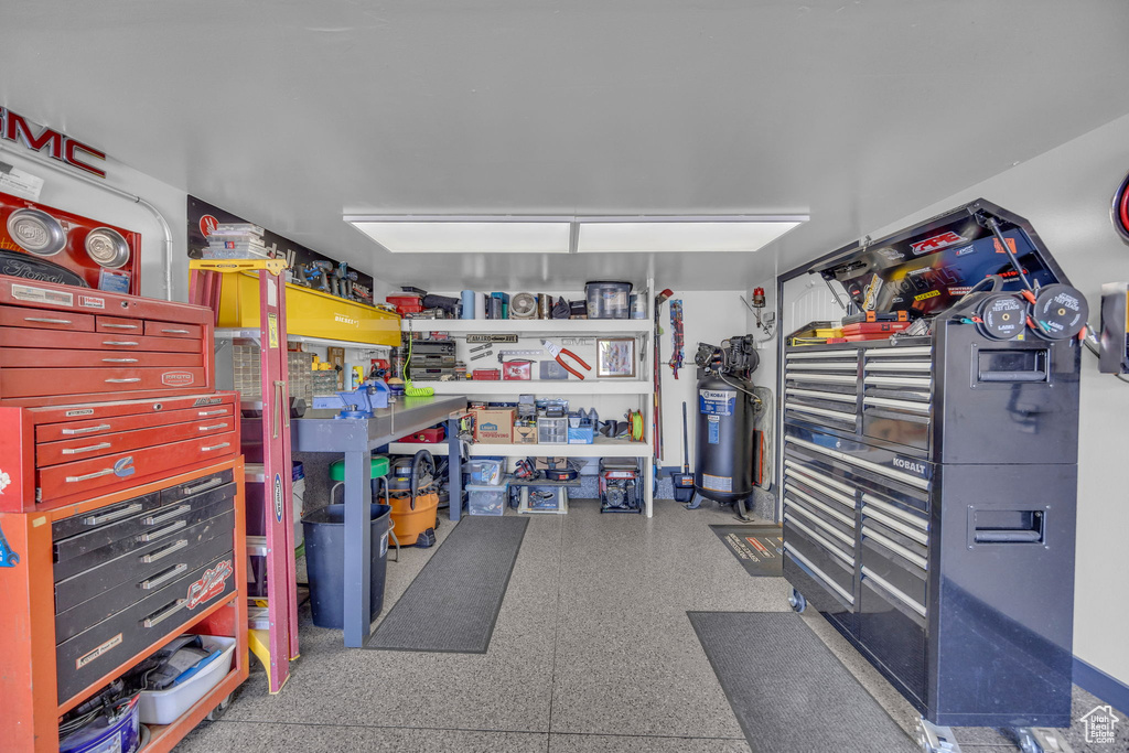 Garage featuring a workshop area