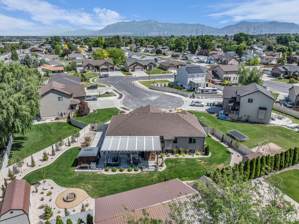 Aerial perspective of suburban area featuring mountains