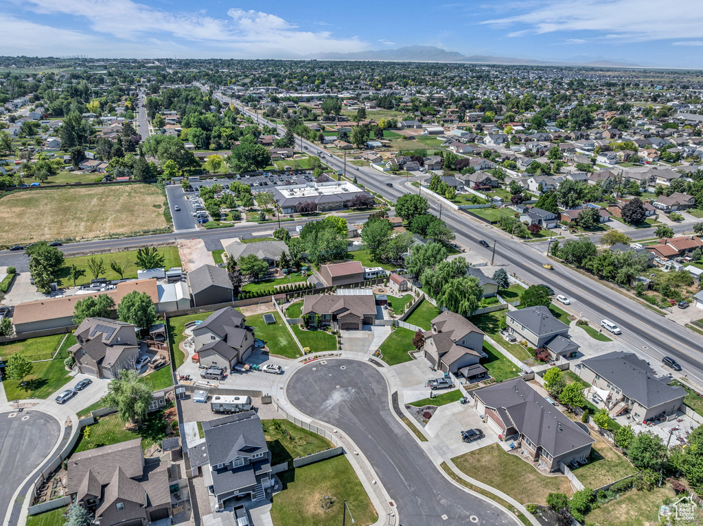 Aerial overview of property\'s location with nearby suburban area