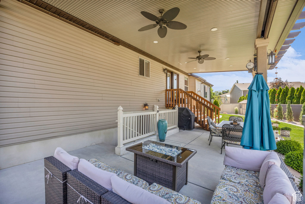 View of patio / terrace featuring an outdoor hangout area, ceiling fan, outdoor dining space, and grilling area