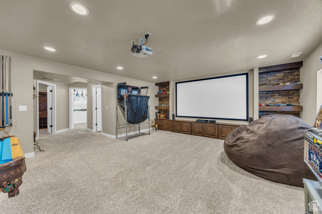 Cinema room featuring carpet flooring and recessed lighting