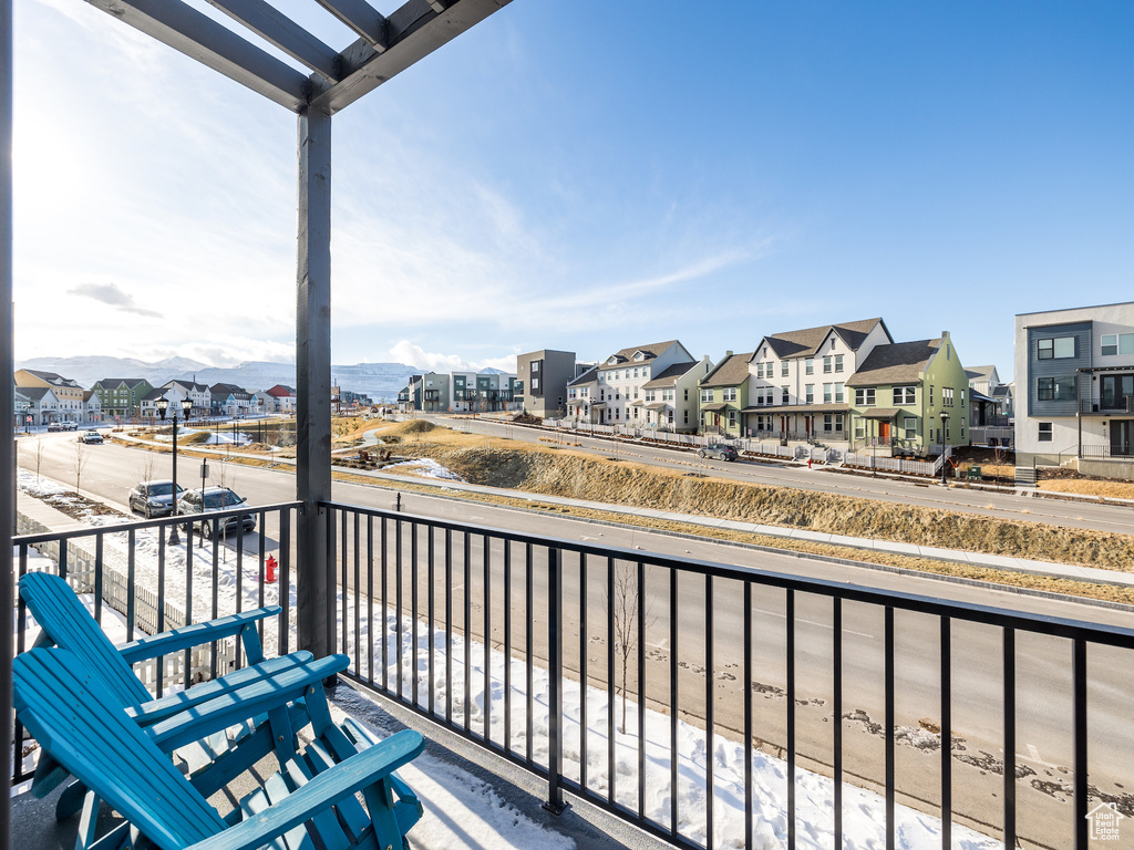 Balcony featuring a residential view