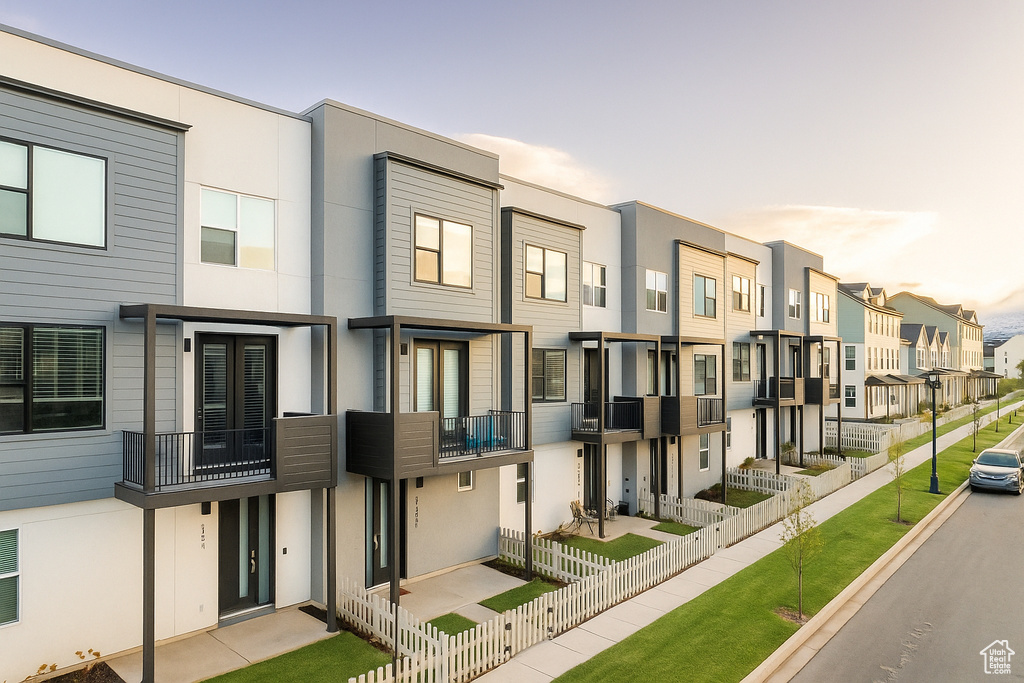 View of building exterior with a residential view