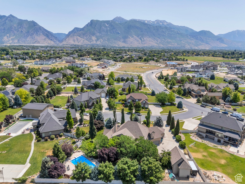 Aerial view of residential area with a mountainous background