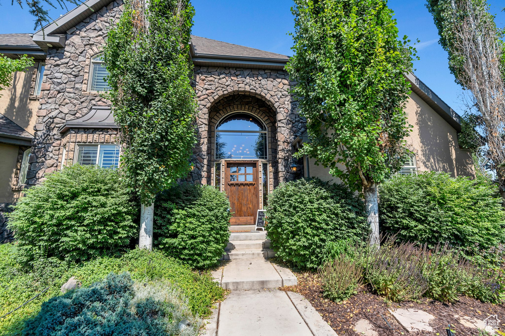 View of front facade with stone siding
