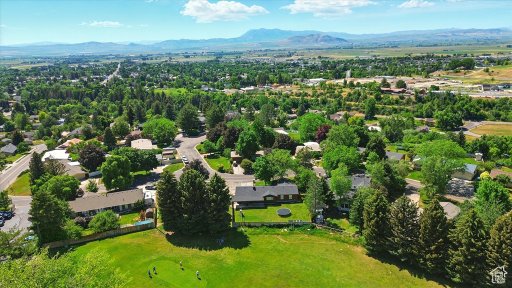Aerial view of residential area with a mountainous background