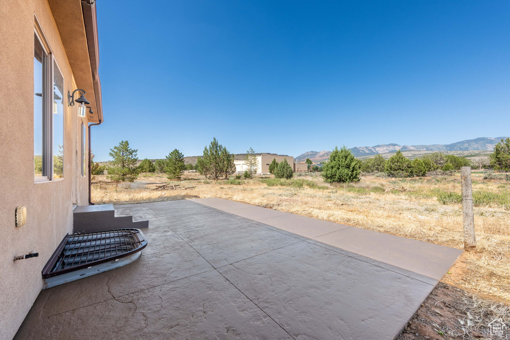 View of patio / terrace featuring a mountain view