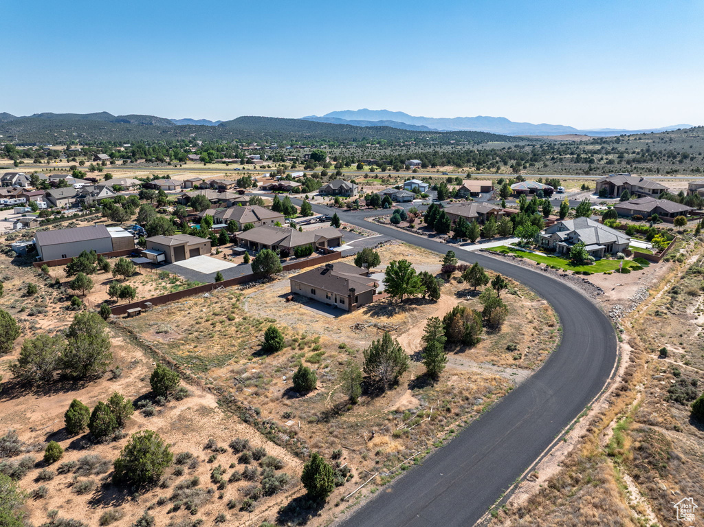 Aerial view of residential area featuring mountains