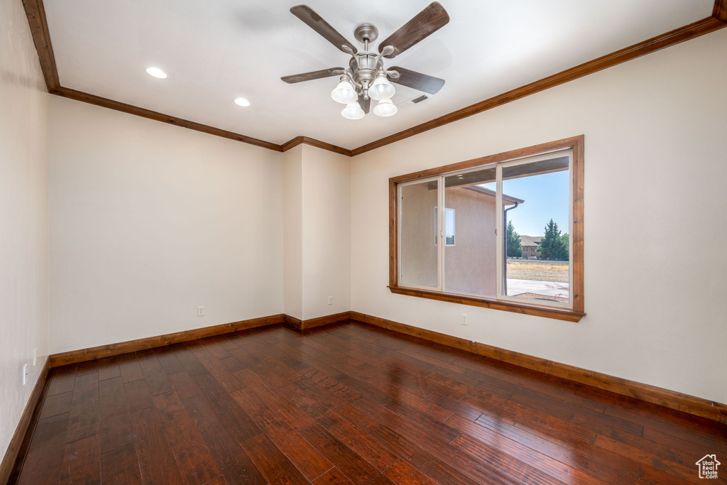 Unfurnished room with ornamental molding, dark wood-style floors, recessed lighting, and ceiling fan