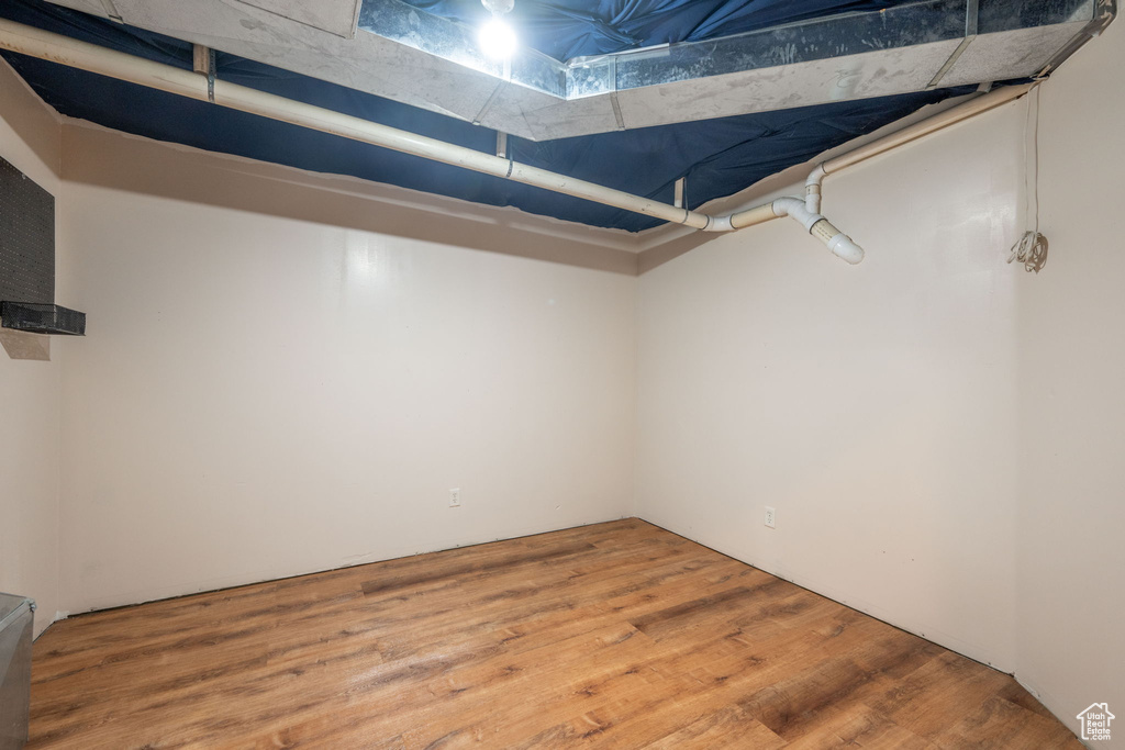 Finished below grade area featuring wood finished floors