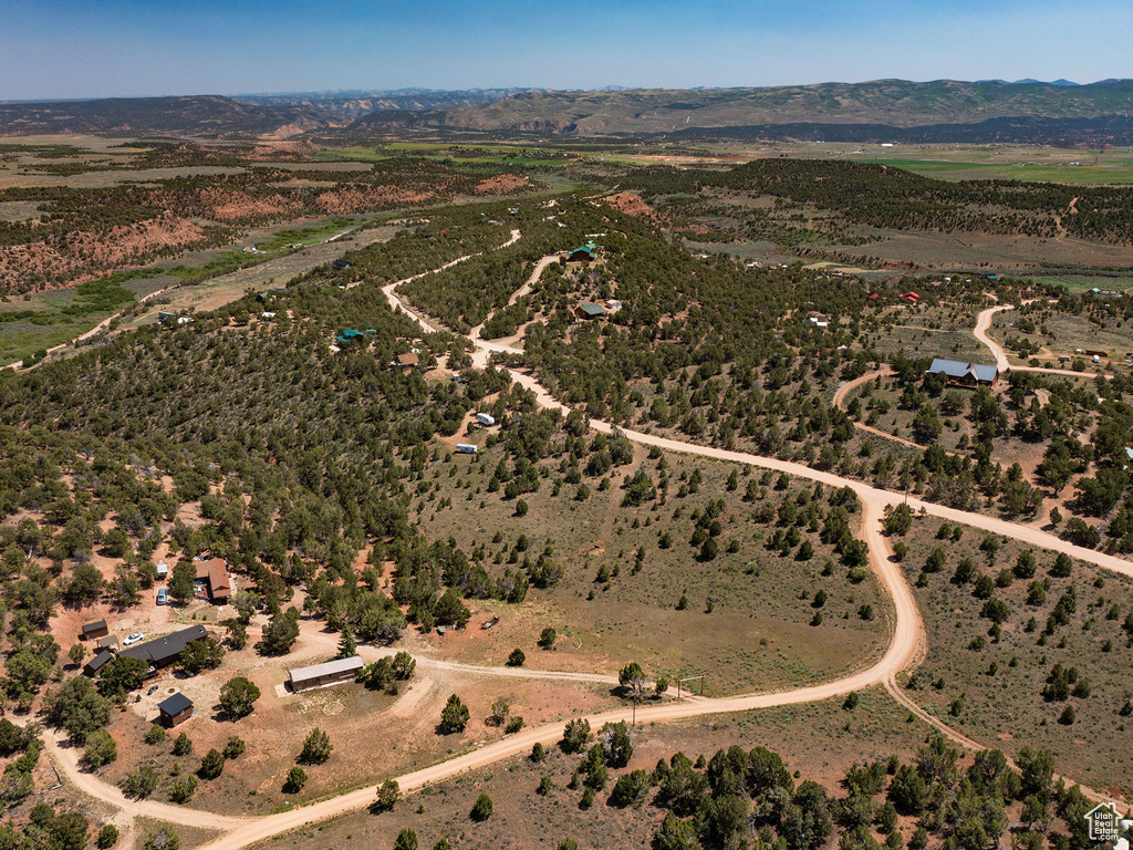 Aerial view of property and surrounding area with rural landscape